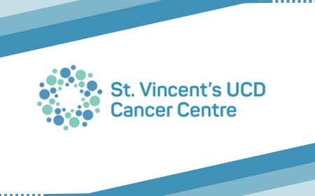 The logo of the St Vincent's UCD Cancer centre. the name of the centre appears next to a circle of different sized smaller circles.